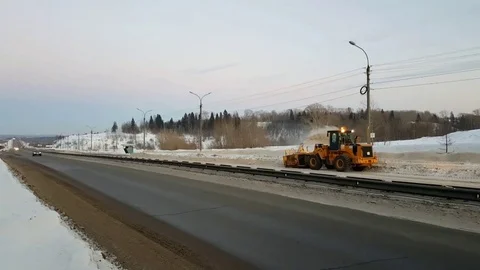 Snow-removing machine on the road Stock-Footage 81589918