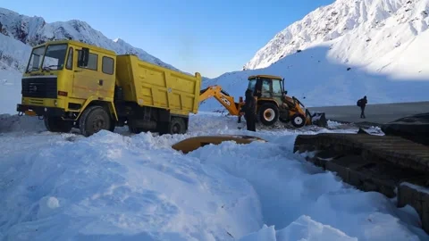 Snow removing work on Himalayan roads using Machinery Stock Footage 196703769