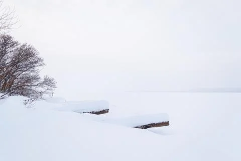 Snow riverside Stock Photos