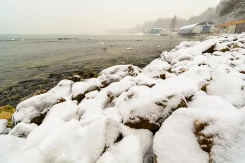 Snow in the rocks Stock Photos