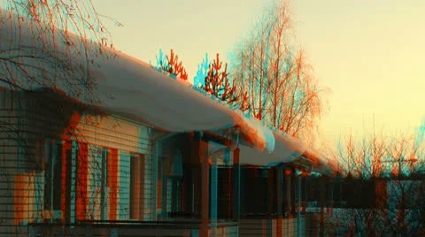 Snow on the roofs at sunset 1 (combo) Stock Footage 10772582