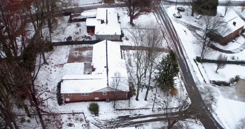 Snow on the rooftops sub urban community Video stock 99608037