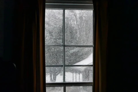 Snow Scene Outside Through a Leaded Glass Window Stock Footage 86034107