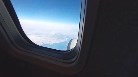 Snow scene seen from the window of an airplane, over Hokkaido Video stock 325643137