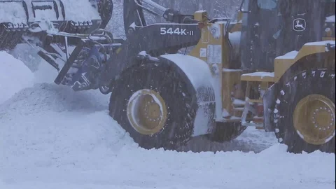 SNOW SCRAPER PLOW LOADER PLOWING SNOW Stock Footage 103295155