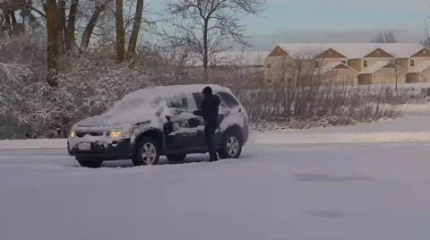 Snow scrapping Stock Footage 44522004