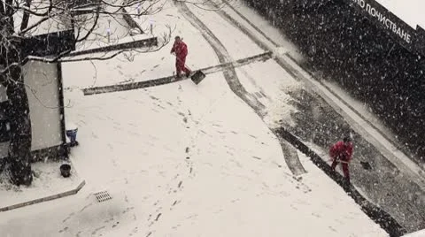 Snow shoveling Stock Footage 10699947
