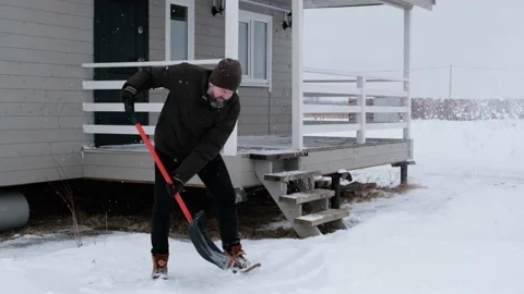 Snow shoveling process Stock Footage 149941535