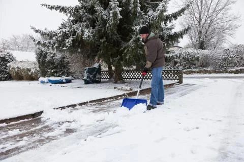 Snow Shovelling Stock Photos