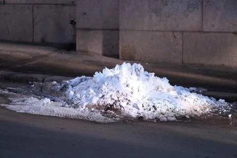 Snow at the side of a road Stock Photos