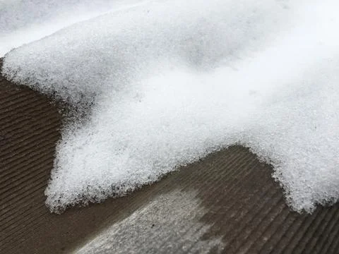 Snow on slate Stock Photos