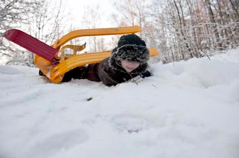 Snow sledge overturn Stock Photos