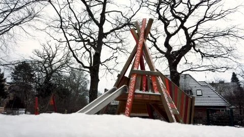 Snow Slide on Playground 库存照片