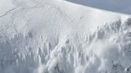 Snow Sliding Down A Rocky Slope During An Avalanche Stock Footage