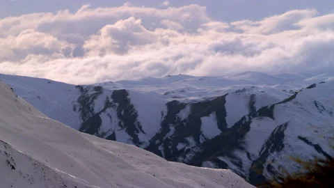 Snow slope with white clouds in distance Stock Footage 159700586