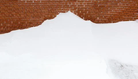 Snow snowdrift a wall. Stock Photos