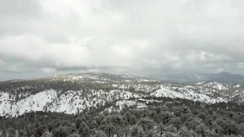 Snow in the spring in Cyprus in the mountains Video stock 171809180