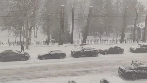 Snow storm blizzard on winer day on a city street. Stock Footage 149257656