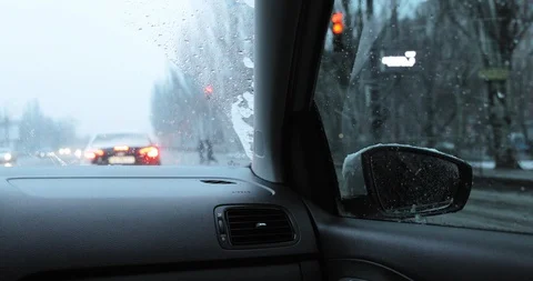 Snow Storm. Car Stops On The Red Traffic Light. Stock Footage 124636000