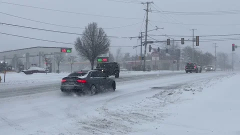 Snow Storm - Stop Light / Intersection with Cars Stock Footage 167853240