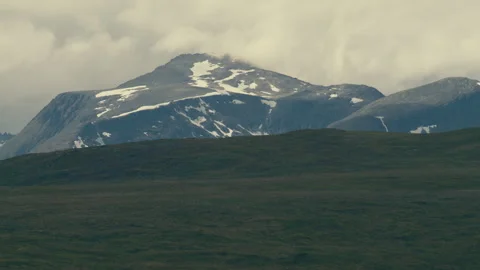 Snow Streaked Peaks Beyond Open Highland at Sunnmøre Norway Stock Footage 340321610