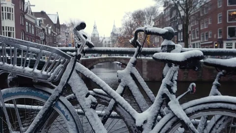 Snow on the streets of Amsterdam Stock Footage 326064306