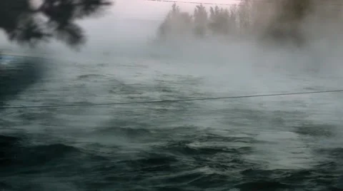 Snow. Sunset in the winter . Snowstorm . Crossing the river . Thresholds River. Stock Footage 62071908