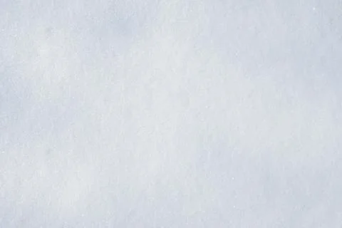 Snow texture background, plain snow with light reflection Stock Photos
