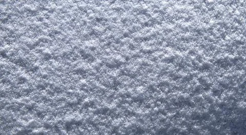 Snow texture on cold surface. Snow pattern with white frost. Frozen snow in.. Stock Photos