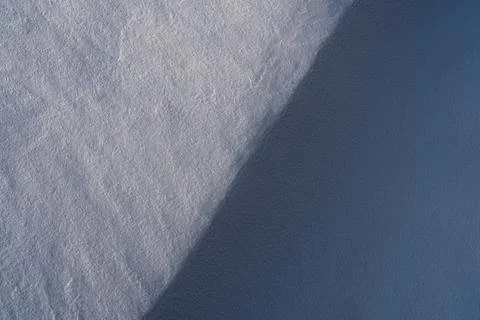 Snow texture, pattern. Light and shadow. Foto stock