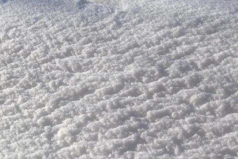 Snow texture. Winter background. Daylight. Snow crystals Stock Photos
