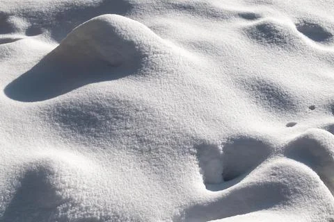 Snow texture. Winter background. Daylight. Snow crystals Stock Photos