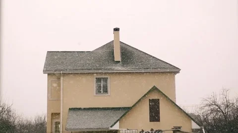 Snow is thick on the background of the building Stock Footage 58402050