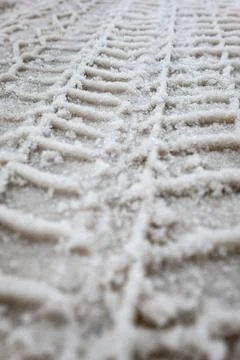 Snow Tire Track Pattern Texture on Frozen Winter Surface Background Stock Photos