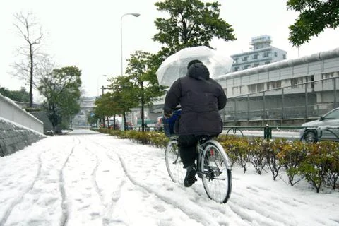 Snow in tokyo Stock Photos