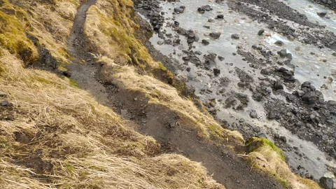 Snow On Top Of Mountain With River Flowing Down From Glacier, Iceland Stock Footage 97412686
