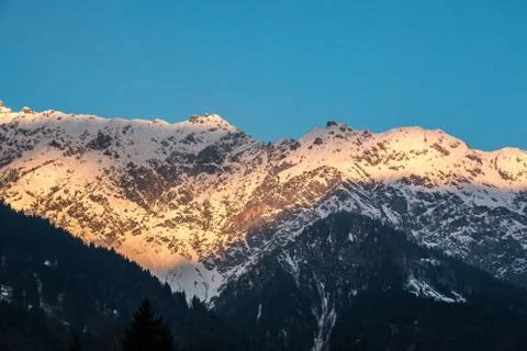 Snow on the top of the mountains Stock Photos