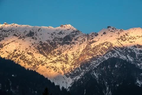 Snow on the top of the mountains Stock Photos