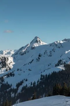 Snow on the top of the mountains Stock Photos