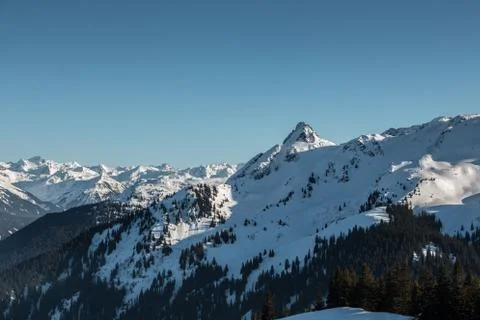 Snow on the top of the mountains Stock Photos