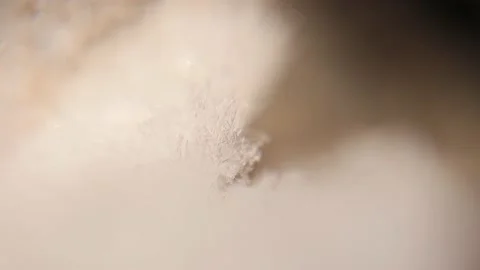 Snow under a microscope. Ice crystals forms at on hoarfrost background Stock Footage 145651365