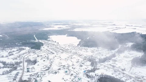 Snow village aerial Stock Footage 101704486