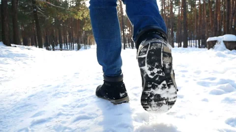Snow walking foot man Stock Footage 101476970