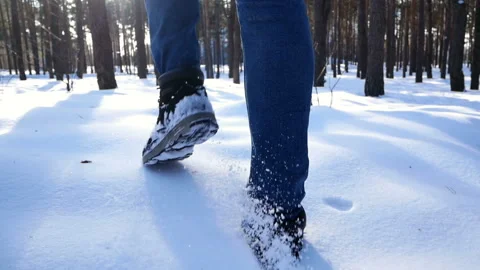 Snow walking foot man Stock Footage 101477308