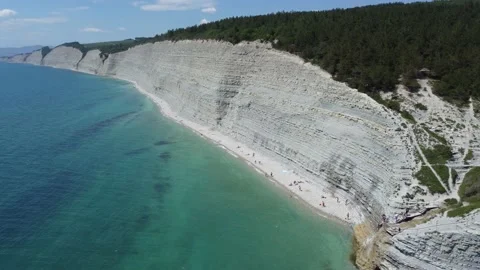 Snow-white beach, washed by turquoise clear water Stock Footage 155648749