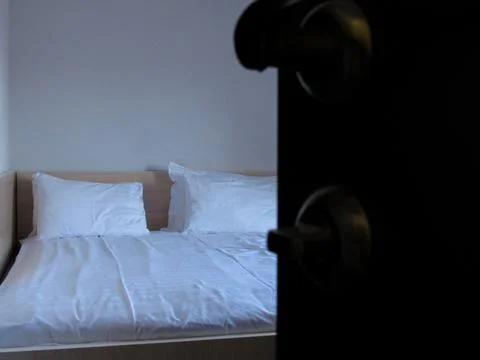 Snow-white bed on the bed Stock Photos