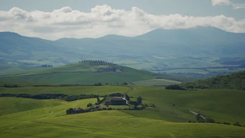 Snow-white clouds quickly float over picturesque landscape of Tuscany. Panorama 스톡 동영상 123556124