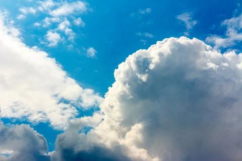 Snow-white light cumulus clouds against a blue sky Stock-Fotos