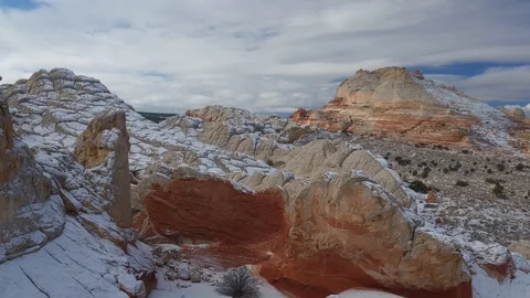 Snow on White Pocket Red Brain Rock Formations, Arizona Stock Footage 101625346