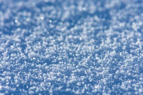 Snow white texture. Background of snow texture. Snowy nature winter backgroun Stock Photos